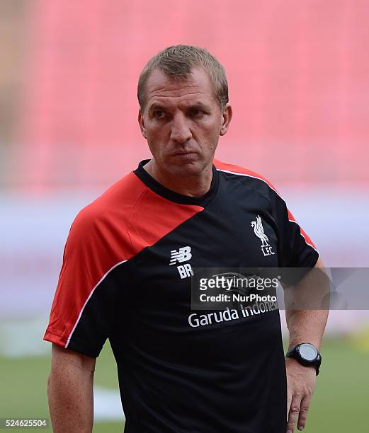 Liverpool coach Brendan Rodgers looks on during a training session at Rajamangala stadium in Bangkok, Thailand on July 13, 2015. Liverpool will play...