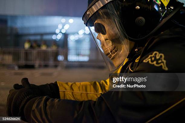 Masked protester, in Hong Kong, on December 11, 2014. On Thursday 11 December 2014, after 74 days of the Occupy Hong Kong protest, visitors make a...