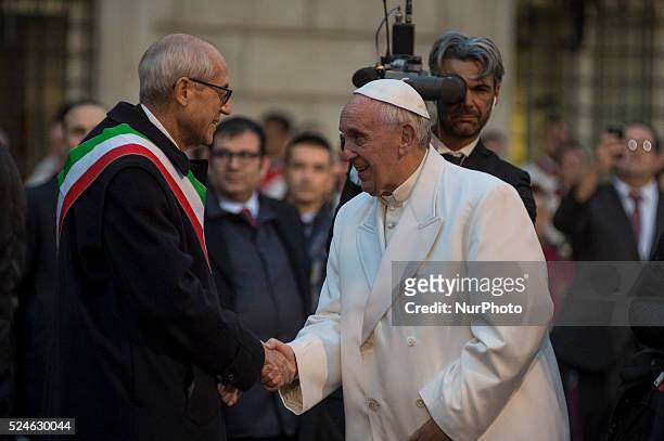 Pope Francis greets Francesco Paolo Tronca, new commissioner of Rome at the statue of the Virgin Mary during the annual feast of the Immaculate...