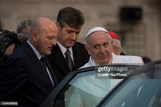 Pope Francis leaves the statue of Virgin Mary during the annual feast of the Immaculate Conception at Piazza di Spagna in Rome on December 8, 2015....