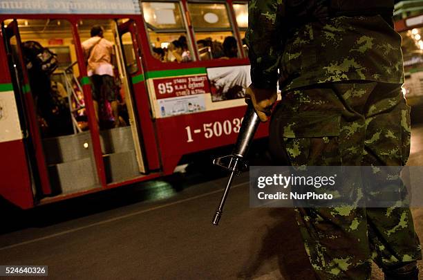 Thai Military move on thousands of anti government protesters from the centre of Bangkok on buses supplied on the second day that the coup was...