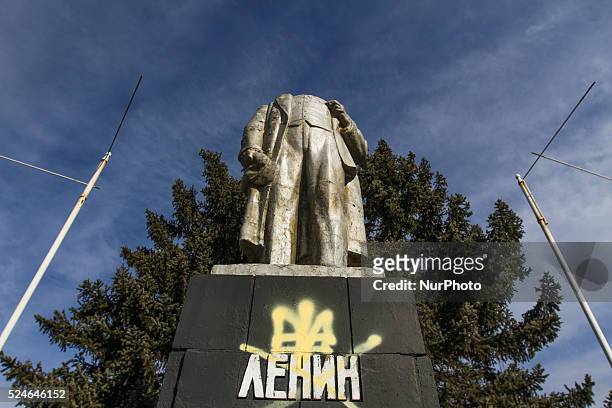 The beheaded statue of Vladimir Lenin is seen in front of the little factory in the eastern Ukraine. President of Ukraine Petro Poroshenko has signed...