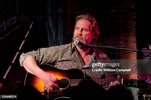 Actor Jeff Bridges, in a real life version of his character Bad Blake, plays songs from his recent movie, Crazy Heart, at the Main Street Show in...