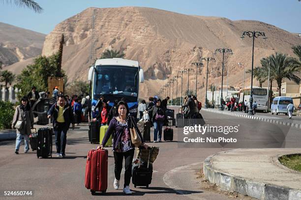 Tourists from India arrive in Egypt after crossing the Taba Land Port on February 18 two days after a tourist bus exploded in the Egyptian south...