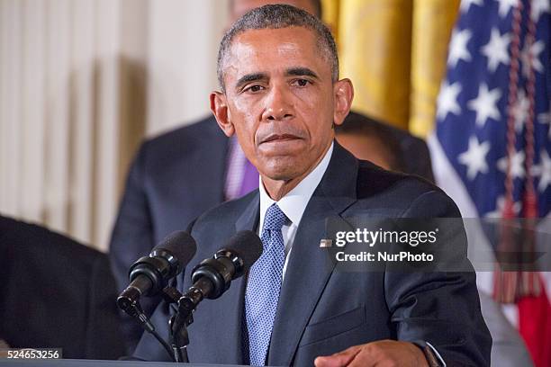 President Barack Obama speaks on reducing gun violence as Vice President JOe Biden looks on in the East Room of the White House on January 5, 2016 in...