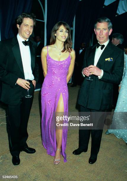 Actors Hugh Grant and Elizabeth Hurley with Prince Charles attend the De Beers/Versace 'Diamonds are Forever' celebration at Syon House on June 09,...