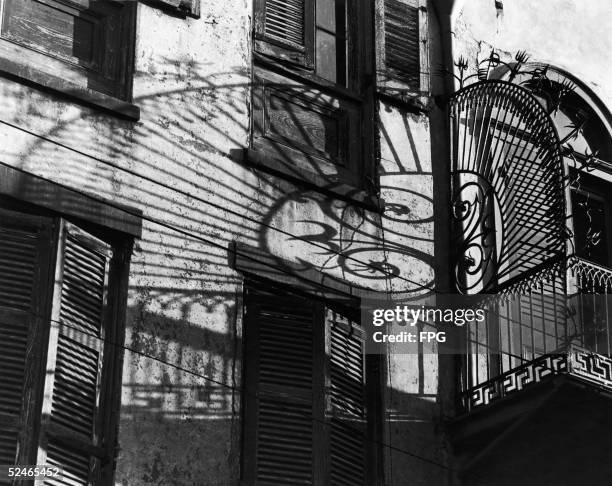 Balcony guard at 520 Royal Street, New Orleans, circa 1930. The 'S' incorporated into the design signals the work of Francois Seignouret, the French...