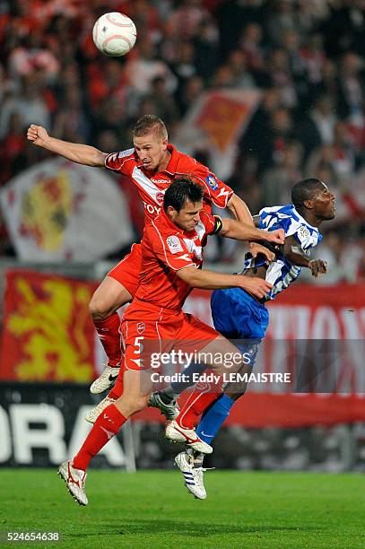 Rafael, Rudy Mater and Franck Djadjedje during the French Ligue 1 soccer match between Valenciennes FC and Grenoble Foot 38.