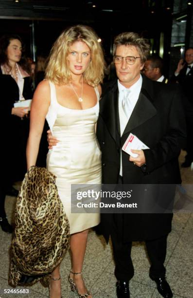 Model Rachel Hunter and husband singer Rod Stewart attend the UK premiere of the movie 'Evita' at the Empire, Leicester Square on December 20, 1996...