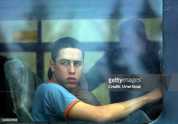 An Israeli rides an army bus after reporting for the draft at the Tel Hashomer induction centre on March 22, 2005 near Tel Aviv, Israel. Alex Cohn...