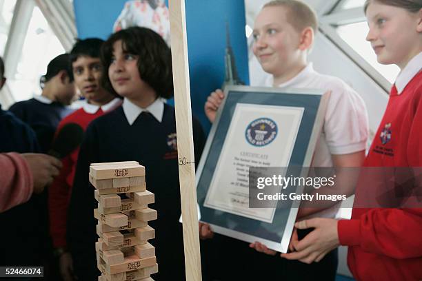 Pupils from Sir John Cass's Foundation School Khuncha Sabir, Charlie Miller and Ruby Carter are interviewed following their successful attempt at the...