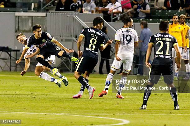 Steven Gerrard of the Los Angeles Galaxy is taken down by Francisco Rivera of Club America during the Los Angeles Galaxy vs Club America match of the...