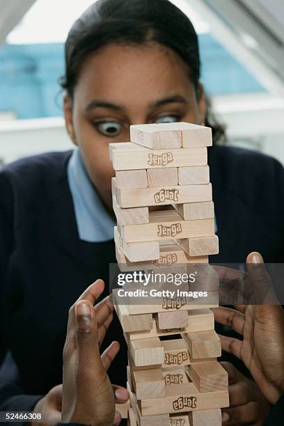 Guinness World Records challenge Jenga enthusiasts to build 30 levels of the popular building game in the fastest time possible at The Walkways,...