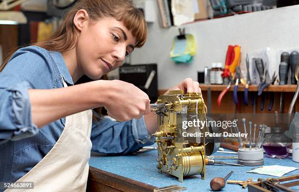 Apprentice Clockwork Adjusting Alarm Clock Photos and Premium High Res Pictures - Getty Images