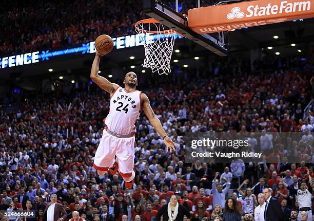 Norman Powell of the Toronto Raptors dunks the ball late in the second half of Game Five of the Eastern Conference Quarterfinals against the Indiana...