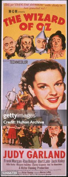 Poster from the film 'The Wizard Of Oz,' shows an illustration of American actress Judy Garland and at top, left to right, actors Frank Morgan , Bert...