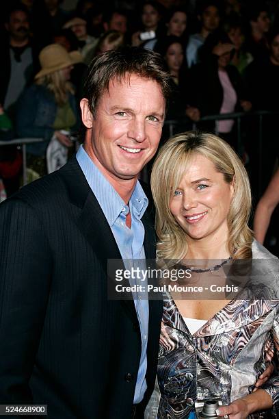 Castmember Chris Potter and wife arrive at the world premiere of "The Pacifier" held at the El Capitan theater in Hollywood.