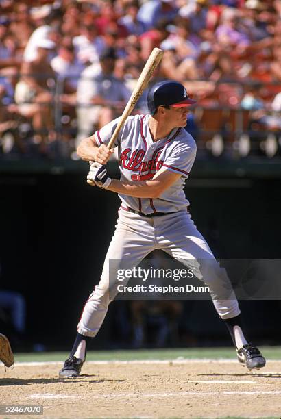 Dale Murphy of the Atlanta Braves stands ready at the plate during a game with the San Diego Padres in 1987 at Jack Murphy Stadium in San Diego,...