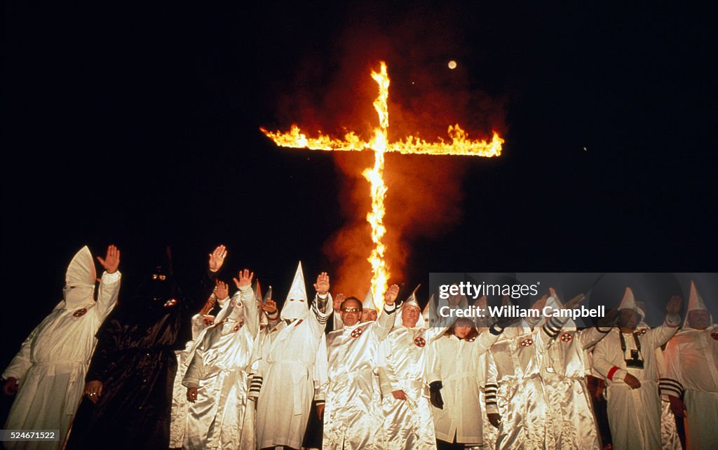 Klu Klux Klan Members Burning Cross