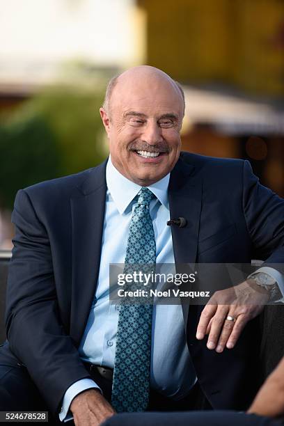 Dr. Phil visits "Extra" at Universal Studios Hollywood on April 26, 2016 in Universal City, California.