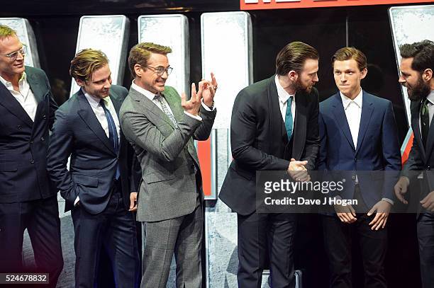 Paul Bettany, Daniel Bruhl, Robert Downey Jr., Chris Evans, Tom Holland and Paul Rudd on stage during the European film premiere of "Captain America:...