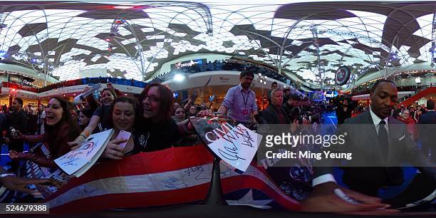 Anthony Mackie signs autographs for fans at the "Captain America: Civil War" European film premiere at Vue Westfield on April 26, 2016 in London,...