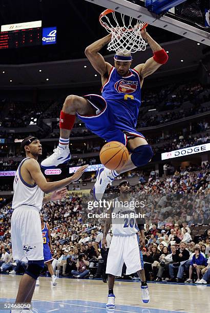 Kenyon Martin the Denver Nuggets dunks on the Washington Wizards in the first half on March 22, 2005 at the Pepsi Center in Denver, Colorado. NOTE TO...