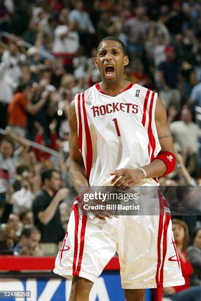 Tracy McGrady of the Houston Rockets reacts to the victory over the Miami Heat on March 22, 2005 at the Toyota Center in Houston, Texas. NOTE TO...
