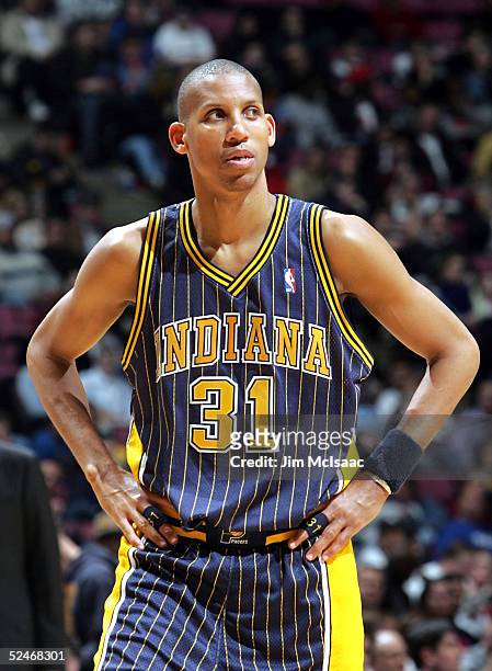 Reggie Miller of the Indiana Pacers looks into the crowd during a time out during their game against the New Jersey Nets on March 22, 2005 at...