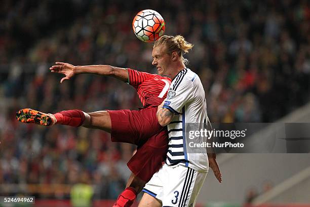 Portugal's midfielder Nani vies with Denmark's defender Simon Kj��r during the UEFA EURO 2016 FRANCE, Qualifying Group I: Portugal vs Denmark at AXA...