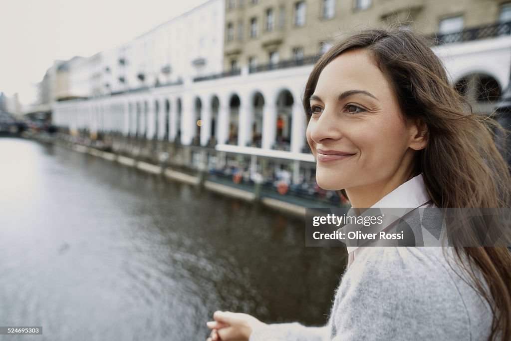 Smiling young woman outdoors