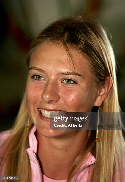 Maria Sharapova of Russia speaks to the press during media day during the NASDAQ-100 Open at the Crandon Park Tennis Center on March 23, 2005 in Key...