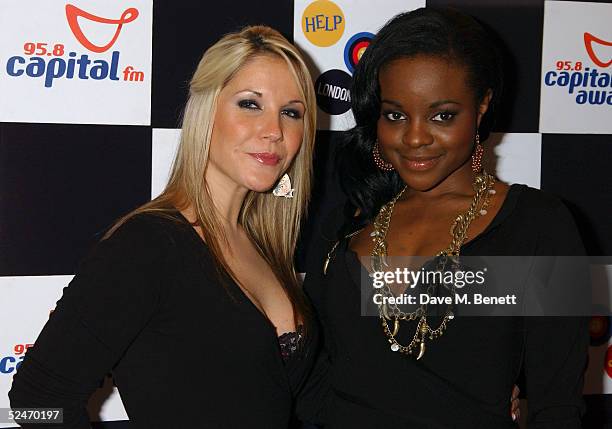 Sugababes members Heidi Range and Keisha Buchanan pose in the Awards Room at the Capital FM Awards 2005 at the Royal Lancaster Hotel on March 23,...