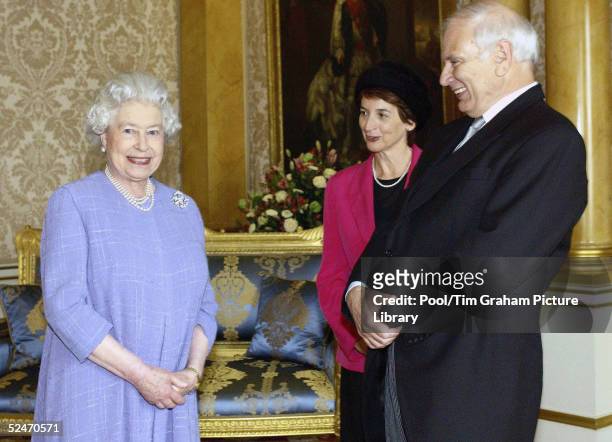 The Queen welcomes the High Commissioner for Australia, the Hon. Richard Alston and his wife, Megs Alston to Buckingham Palace on March 23, 2005 in...