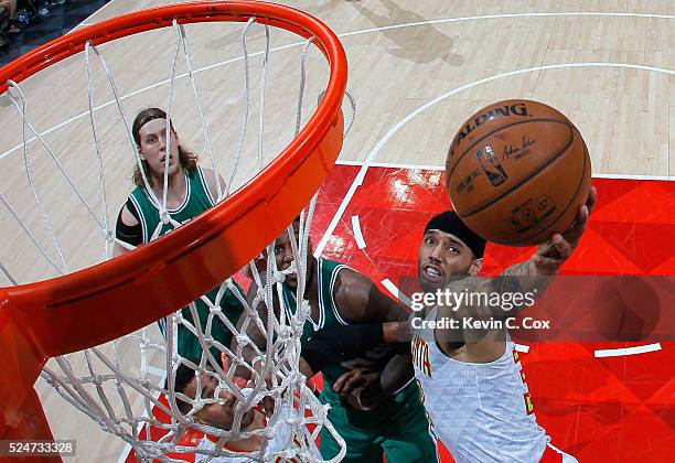 Mike Scott of the Atlanta Hawks battles under the basket against Jae Crowder of the Boston Celtics in Game Five of the Eastern Conference...