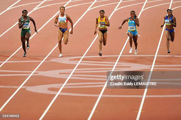 Oludamola Osayomi, Christine Arron, Vida Anim, Debbie Ferguson-McKenzie and Yomara Hinestroza during a preliminary heat in the women's 100m sprint at...