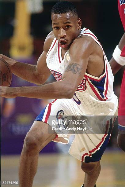 Allen Iverson of the Philadelphia 76ers drives to the basket against the Los Angeles Lakers on October 19, 1996 at the Great Western Forum in Los...