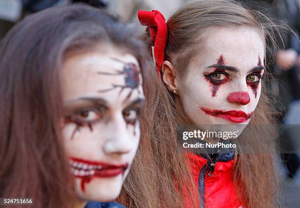 People take part at the &quot;Zombie walk&quot;,dedicated to the Halloween,in the center of Kiev,Ukraine,31 October,2015.