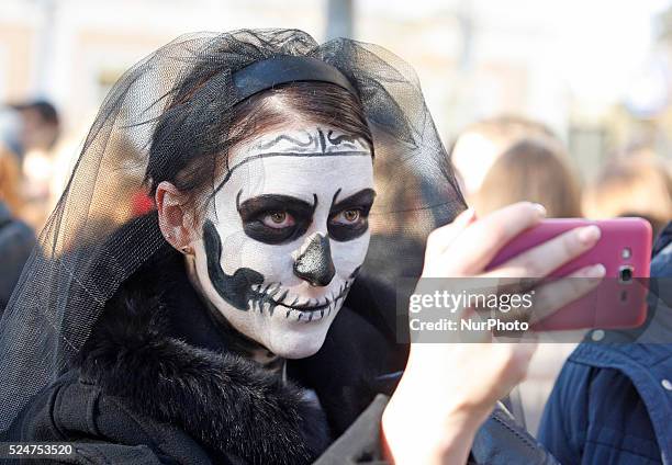 Girl take a photo during the &quot;Zombie walk&quot;,dedicated to the Halloween,in the center of Kiev,Ukraine,31 October,2015.