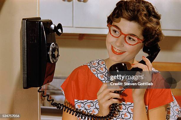 Woman Talking on Rotary Phone