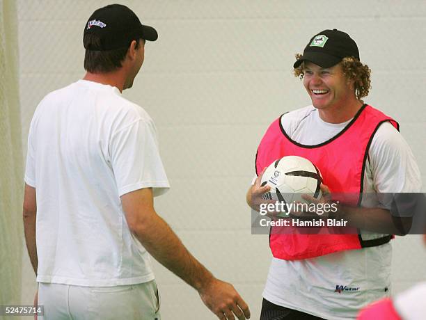 Stephen Fleming and Hamish Marshall of New Zealand share a joke during training at Eden Park on March 25, 2005 in Auckland, New Zealand.