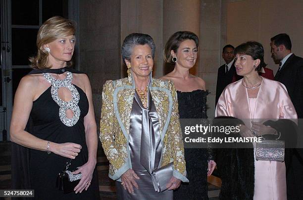 Mrs. Barnier, Anne-Aymone Giscard d'Estaing, Mrs. Cope and Anne-Marie Raffarin attend the 13th International Night of Childhood in Versailles.