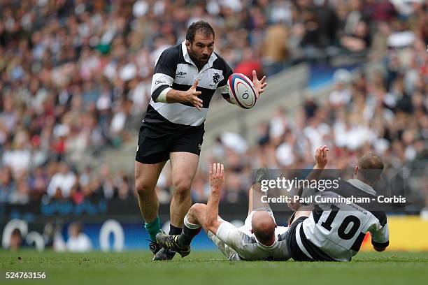 Rugby Union - Salvatore Perugini collects the ball during the England XV vs Barbarians match, played at Twickenham Stadium in London. 29 May 2011