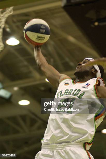 Darius Rice of the Florida Flame dunks against the Huntsville Flight March 24, 2005 at the Germain Arena in Fort Myers, Florida. NOTE TO USER: User...