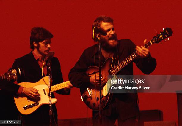 Robbie Robertson and Levon Helm of The Band performing in concert at Queens College, New York, January 9, 1970.
