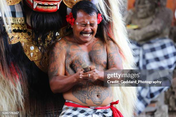 indonesia: barong ceremony in bali - barong dance stock pictures, royalty-free photos & images