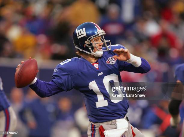 Eli Manning of the New York Giants passes during the game against the Pittsburgh Steelers at Giants Stadium on December 18, 2004 in East Rutherford,...