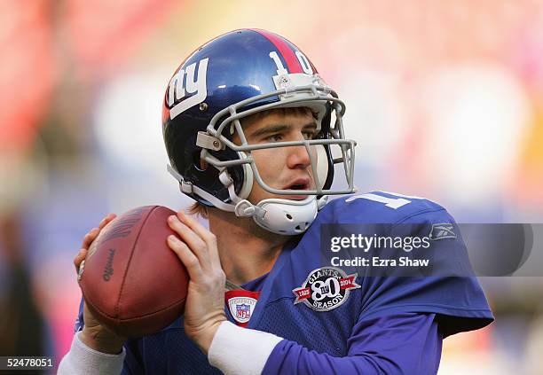 Eli Manning of the New York Giants warms up prior to the game against the Pittsburgh Steelers at Giants Stadium on December 18, 2004 in East...