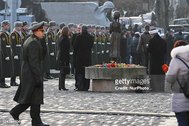 Chairman of the Spiritual Administration of Muslims of Ukraine Mufti Sheikh Ahmad Tamim is seen praying next to the Famine victims memorial in Kyiv,...
