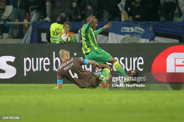 Porto's Brazilian defender Maicon vies with CD Tondela's Jhon Murillo and Manuel Mota referee scored penalty during the Premier League 2015/16 match...